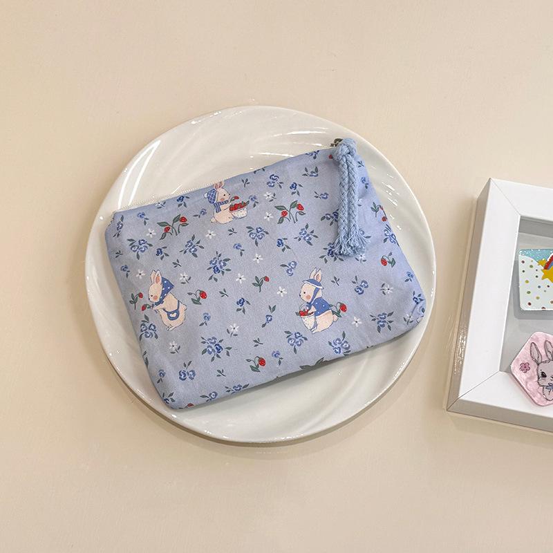 Adorable Blue Cartoon Makeup Bag: Mini Pure Cotton Coin and Earphone Pouch, Lipstick Carrier, Portable Storage.