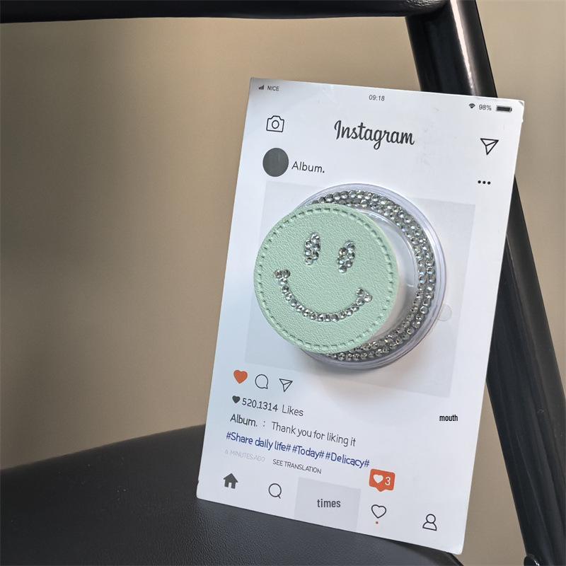 

Korean-Style Smiley Face Rhinestone Leather MagSafe Retractable Phone Holder with Strong Magnetic Grip