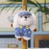 Plush Dog Charm With Denim Overalls For Collectors And Giftgiving