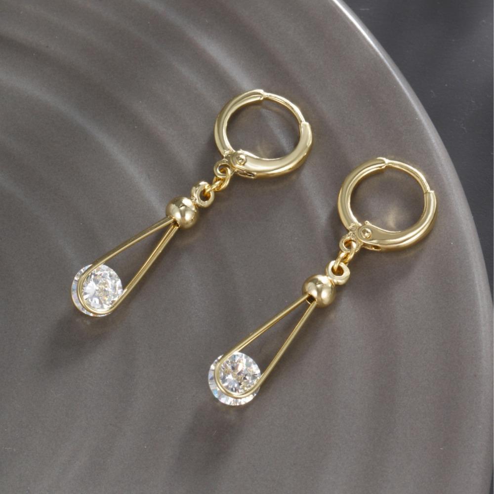 

Золотые длинные серьги в форме капли для женщин, отличающиеся холодной и отстраненной европейской и американской индивидуальностью, в качестве ювелирного подарка