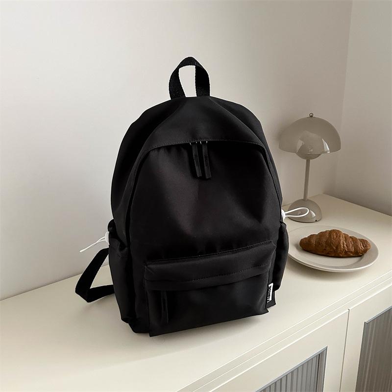 New solid color large-capacity simple casual Oxford cloth student class schoolbag men's and women's casual backpack