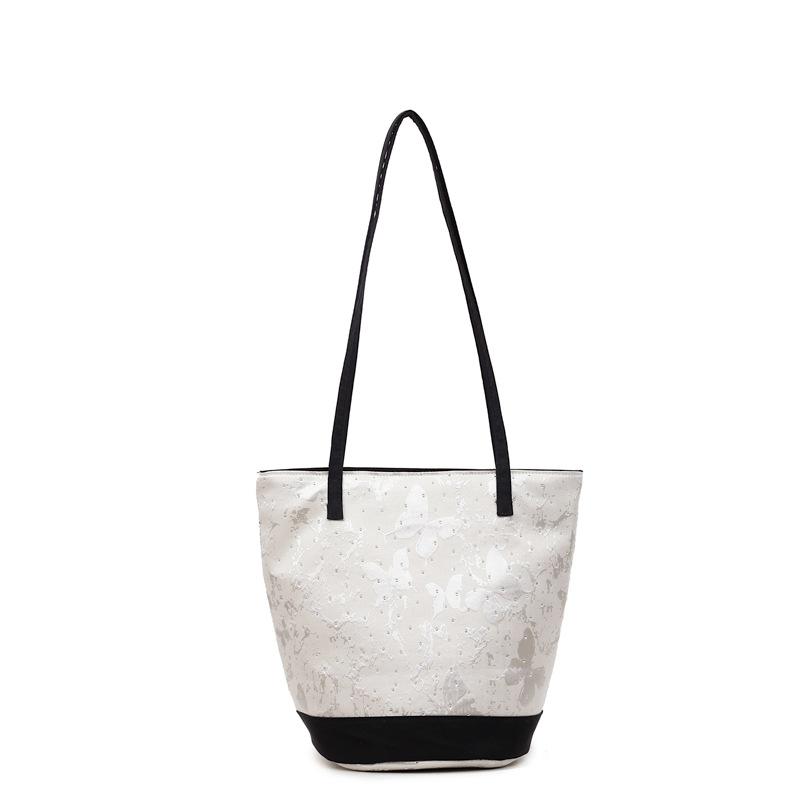 Summer contrast niche butterfly bucket bag 2025 summer new fashion simple foreign style underarm shoulder bag
