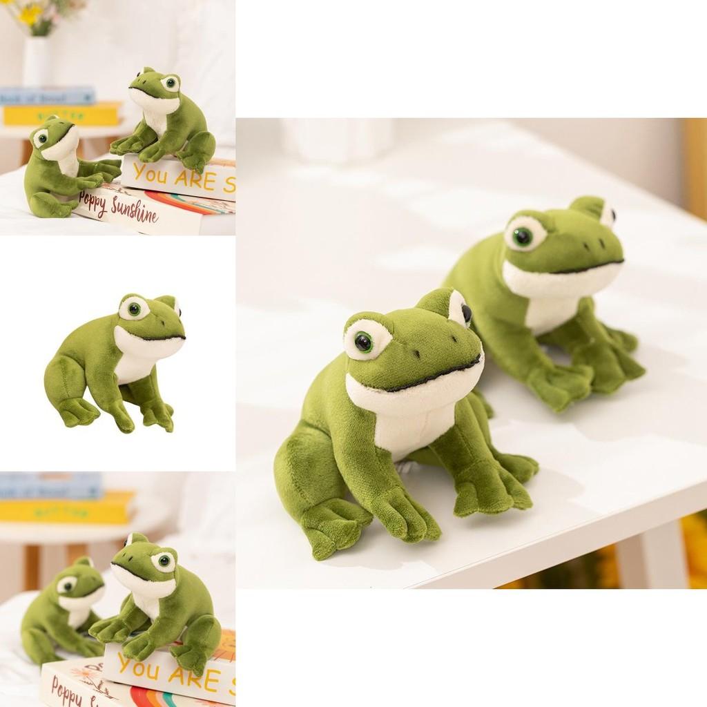 Pluche kikker in zittende positie met grote ogen, ideaal als cadeau en decoratie voor kinderen.