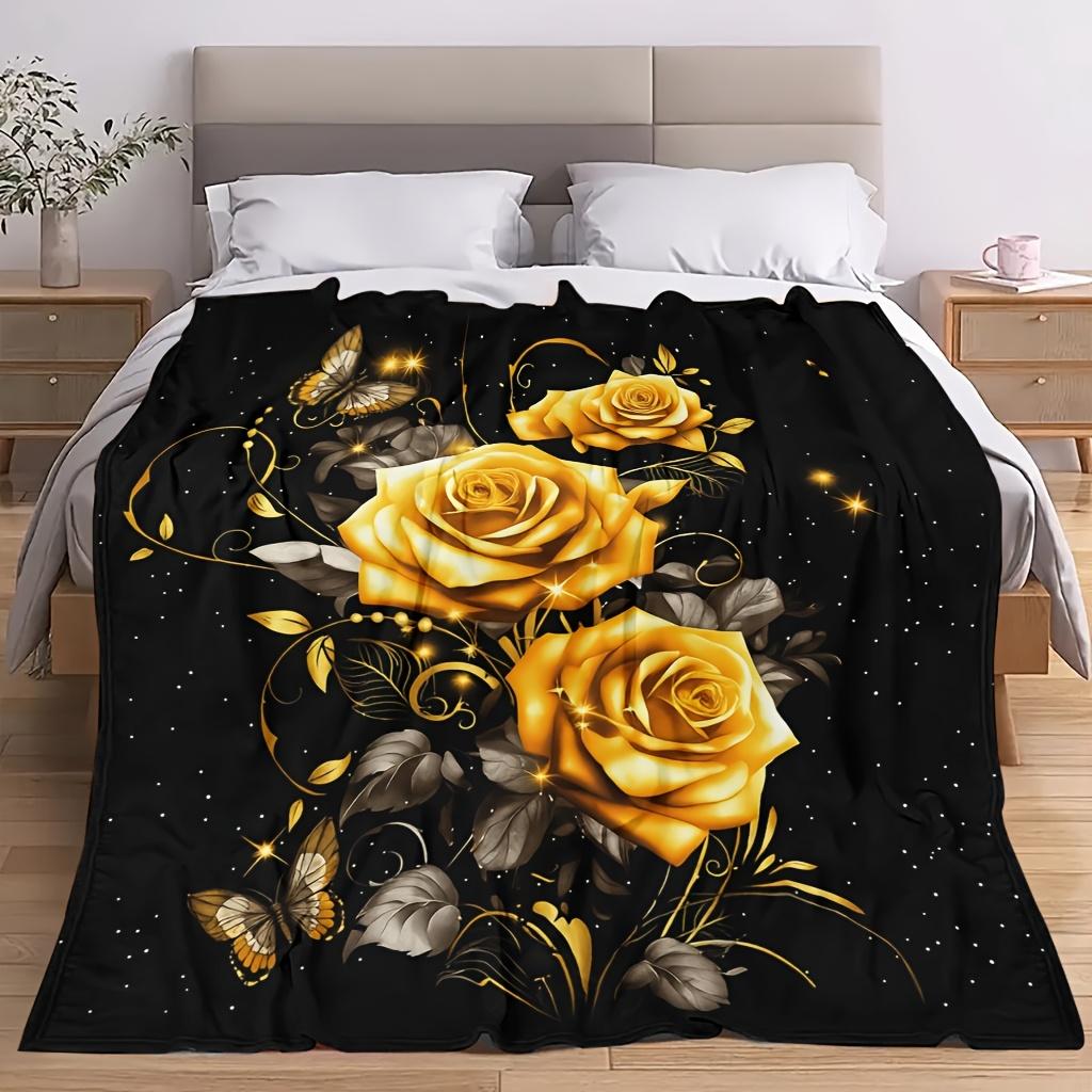 A Cozy Fleece Blanket Featuring a Rose Theme with Soft, High-Definition Digital Printing. It Has a Black Background with Golden Roses, Suitable for Ye