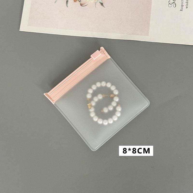 High-End Pink Zipper Jewelry Bag: Dustproof, Thickened Texture, Portable Storage for Earrings and Bracelets.