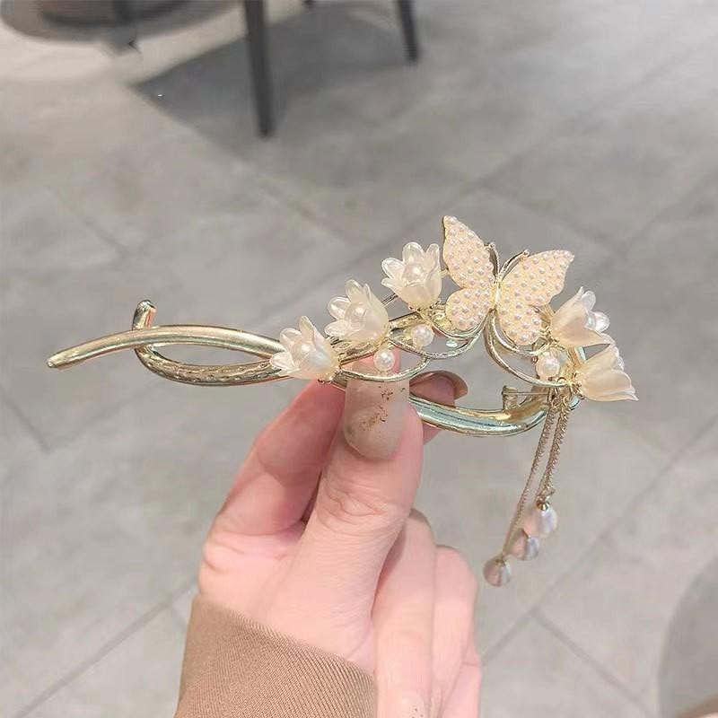 Factory direct fashion flower pearl twist clip elegant hairpin Internet celebrity head spring clip