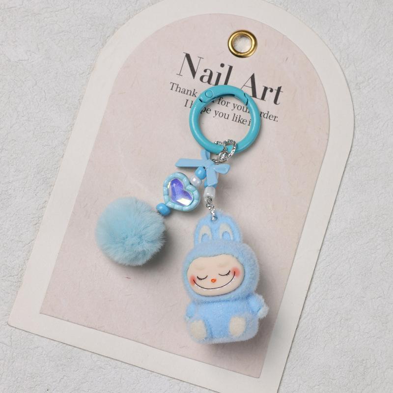 Sitzender Beflockungs-Schlüsselanhänger DIY Niedliche Korn Einzelpuppen-Zubehör Weichkleber Niedliches Korn Baby Lauftasche Handy-Anhänger