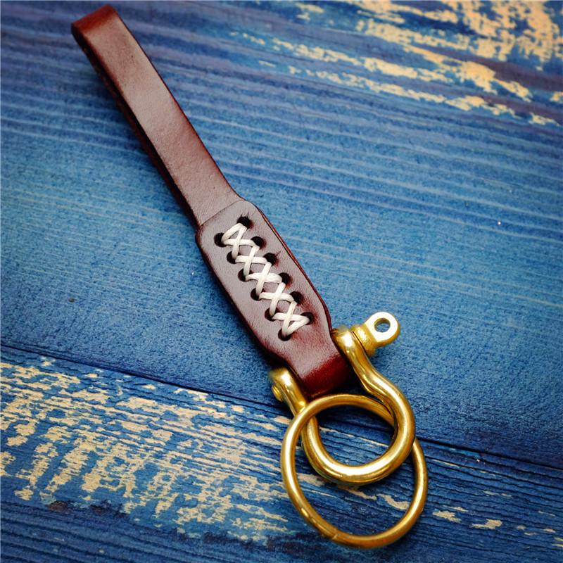 Braided Vegetable-Tanned Cowhide Keychain with Brass and Copper Horseshoe Buckle