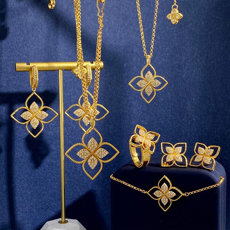 Ohrringe mit Glücksklee-Anhänger, hohle vierblättrige Blume, leuchtendes Zirkonia-Kreuz, Blumen-Ohrringe-Set