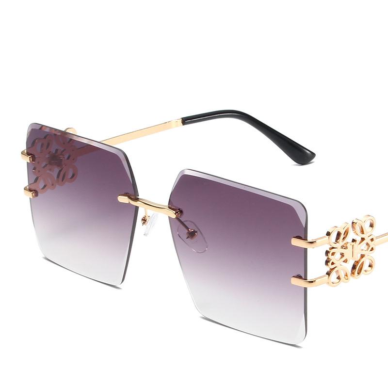 Damenbrille Sonnenschutz UV-Schutz Mode Persönlichkeit Retro Künstlerische Straßenaufnahme Konkave Form Reise Chinesischer Knoten Randlose Sonnenbrille