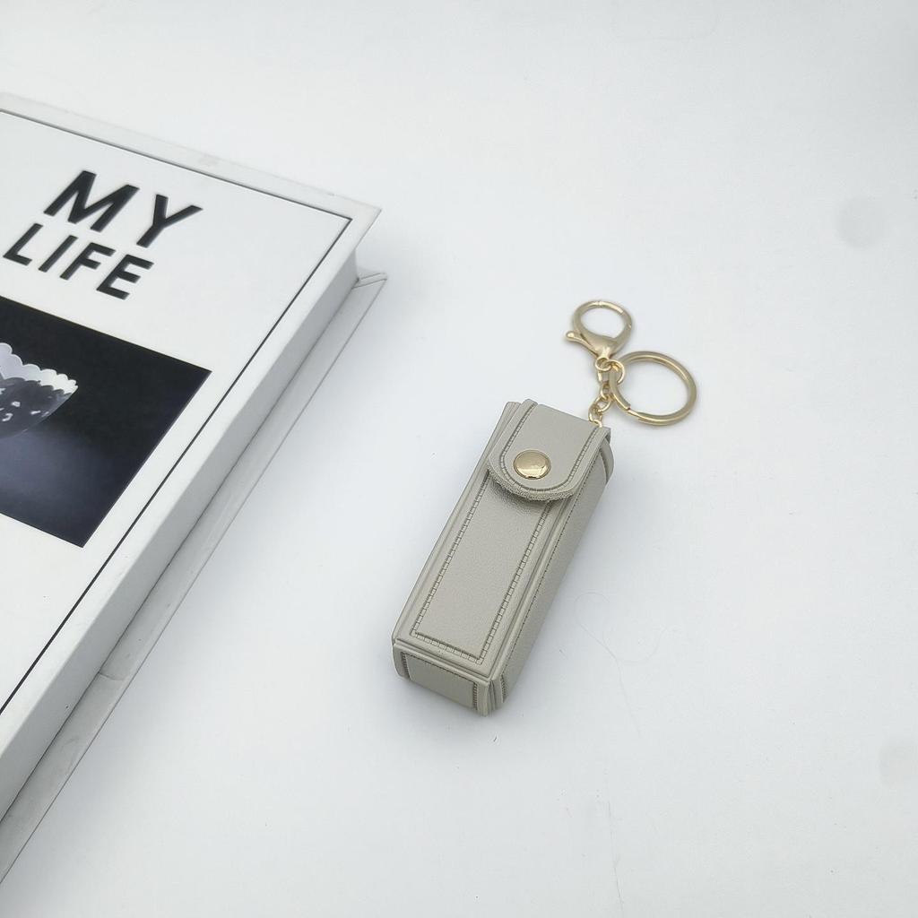 Přenosné pouzdro na rtěnku ve tvaru srdce s ochrannou kůží a roztomilou klíčenkou s přívěskem