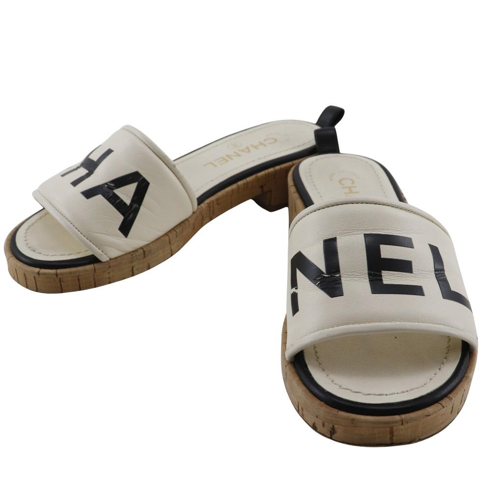 

CHANEL logo Mule G34876 White / black leather/cork Women Used