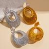 European and American personalized golden velvet woven hollow oval silver needle earrings niche earrings 