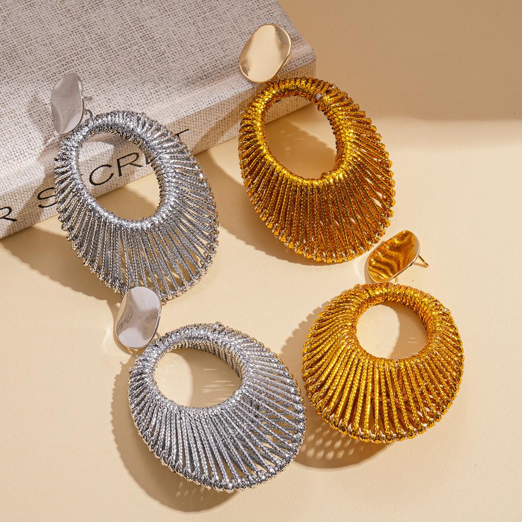 European and American personalized golden velvet woven hollow oval silver needle earrings niche earrings 