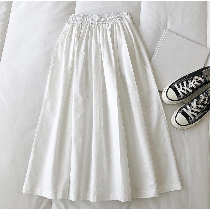 Модные женские юбки длиной до колен с карманами и складками — фото 3