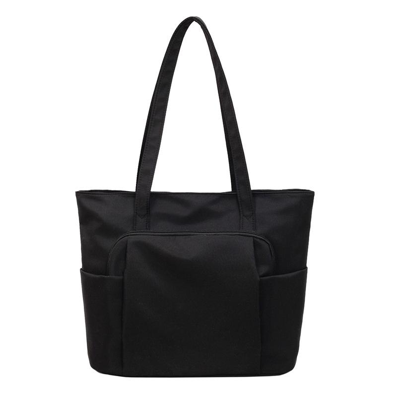 

Large Capacity Nylon Tote Bag for Women with Front Zip Pocket and Side Pockets Durable Shopping Bag for Work and Daily Use