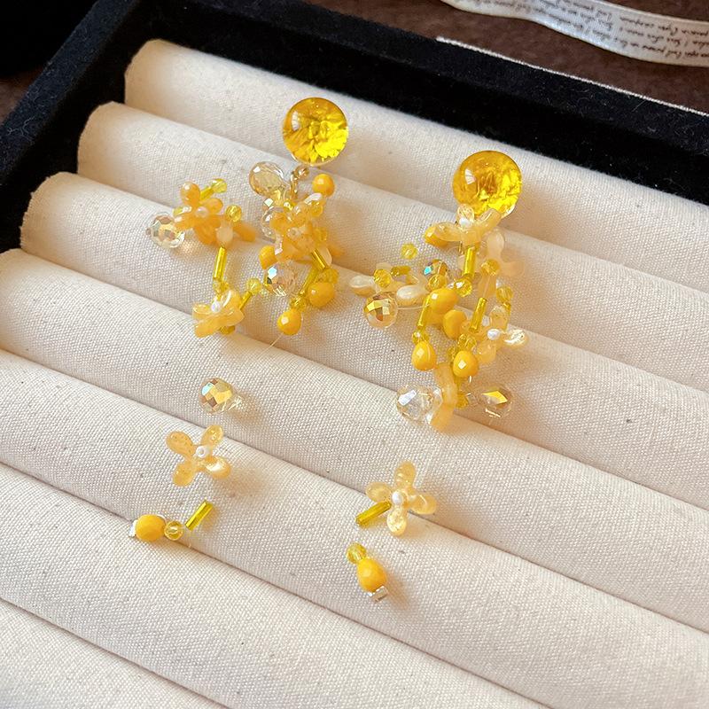 

Silver needle early spring explosion yellow petal fringed earrings exquisite sweet fashion earrings versatile seaside earrings