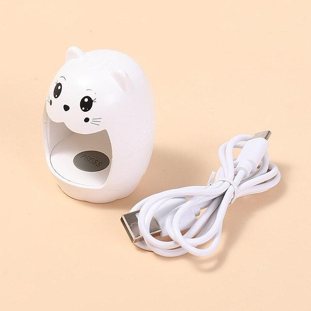 

Мини-аппарат для фототерапии в мультяшной форме, светильник для наращивания ногтей на один палец, светодиодный быстросохнущий светильник для ногтей, масла, клея, светильник для выпечки USB белый