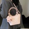 Korean version of trend, high-end printing temperament, portable bucket bag, niche fashion commuting versatile light luxury messenger bag, women