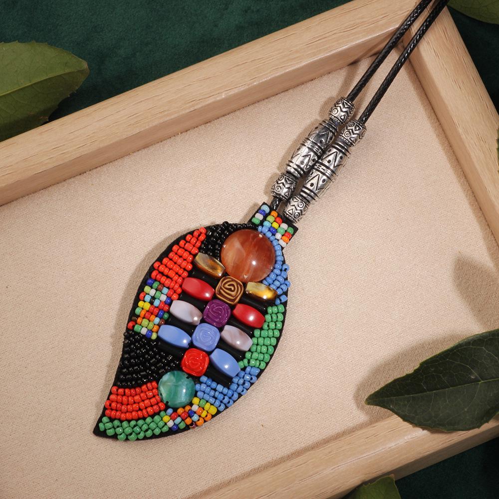 

Богемское этническое кожаное ожерелье с кисточкой