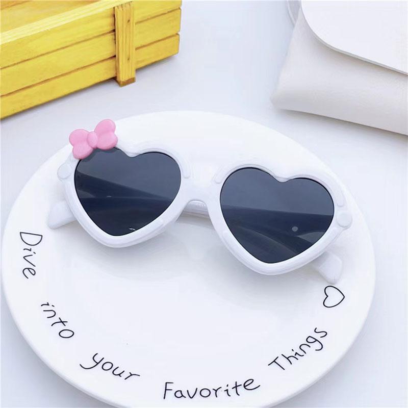 Neue Kinder-Sonnenbrille in Herzform Mädchen-Dekorative Schleife Sonnenbrille Niedliche Baby-Outdoor-Sonnenblende Brillen UV400