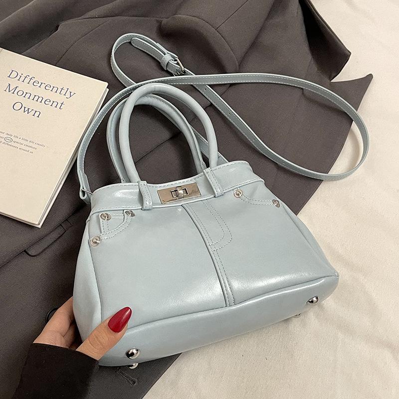 Spring and Summer New French Fashion Commuter Style Portable Bucket Bag Women's Versatile High-quality Foreign Leisure Messenger Bag