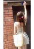 French Retro Apricot Polka Dot Spaghetti Strap Dress for Women - A-line, Waist-cinching Flared Short Skirt (2026 Style).