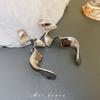 European and American exaggerated metal lines twisted geometric earrings cold wind long stud earrings personalized earrings women
