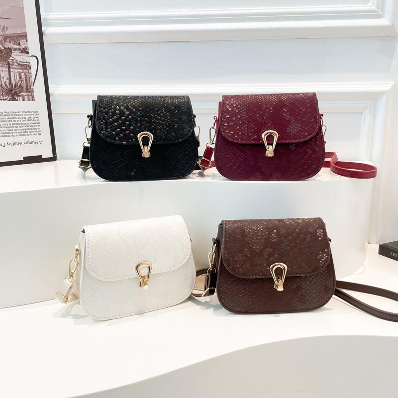 Damenhandtasche im ausländischen Stil mit Webmuster, Frühjahr 2025, schlichte kleine quadratische Tasche, modische einfarbige Retro-Umhängetasche mit Verschluss, Schultergurt
