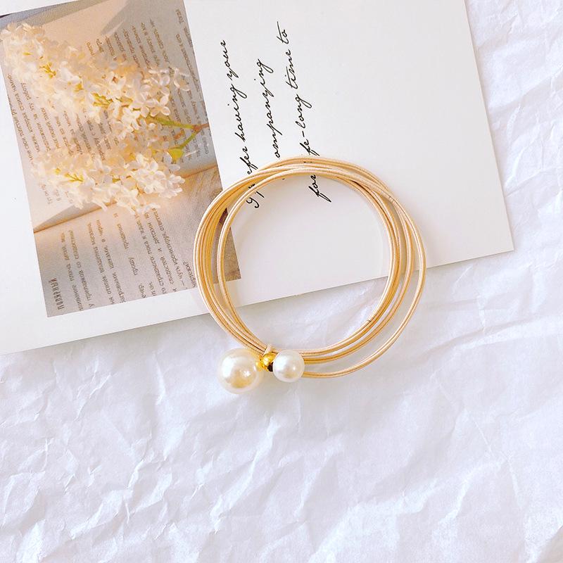 Elegant Korean Pearl Knot Hair Tie - High Elasticity Rubber Band Accessory.