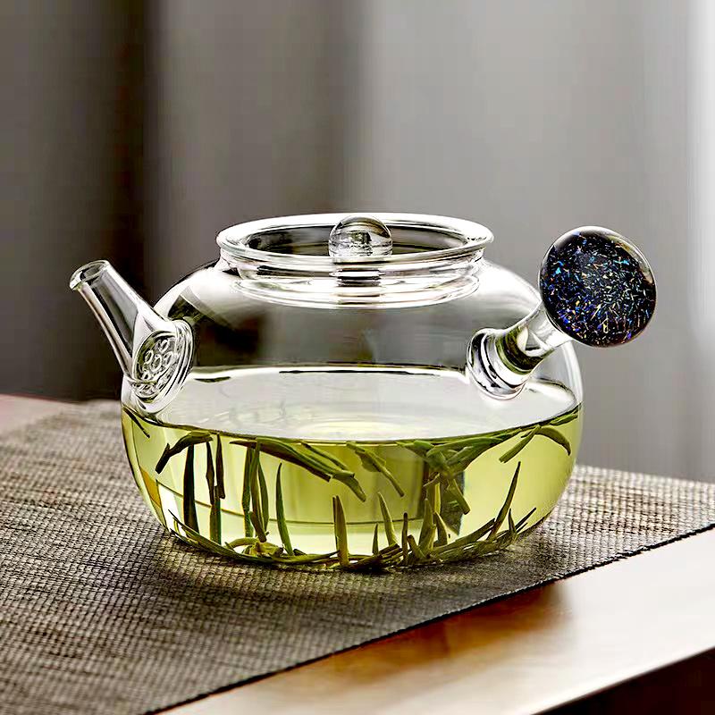 

Изысканный стеклянный чайник 750 мл с узором «Звездное небо» и боковой ручкой, с отверстием-фильтром, для заваривания зеленого чая, чайный набор для кунг-фу чистый