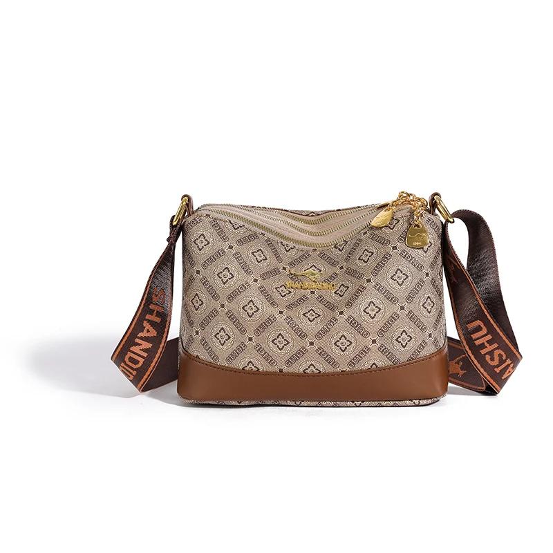 

Элегантная женская сумка через плечо с широким ремнем и высококачественной фурнитурой.