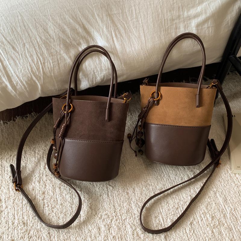 2025 new small bag women's messenger bag retro splicing handbag matte texture bucket bag shoulder bag