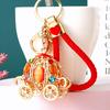 Elegant Pumpkin Car Charm Keychain Accessory For Women With Metallic Finish And Colorful Ropes Ideal For Gifts And Special Occasions