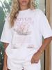 T-shirt oversize con stampa Y2K: Loto