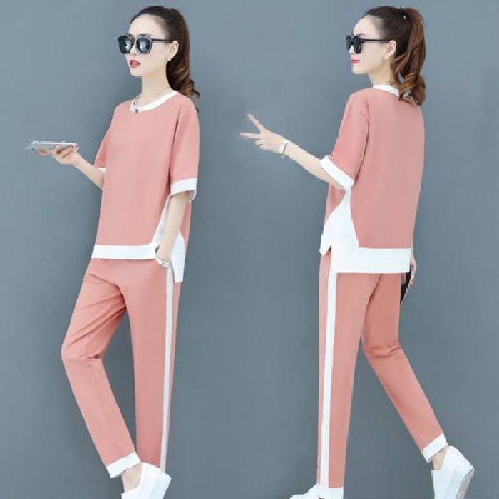 

Жіночий повсякденний літній спортивний одяг у корейському стилі: Комплект з двох предметів: топ з коротким рукавом та бавовняні широкі штани довжиною дев ять десятих. XXXXL рожевий