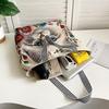 Ethnic Style Embroidered Canvas Shoulder Bag with Gold Thread.