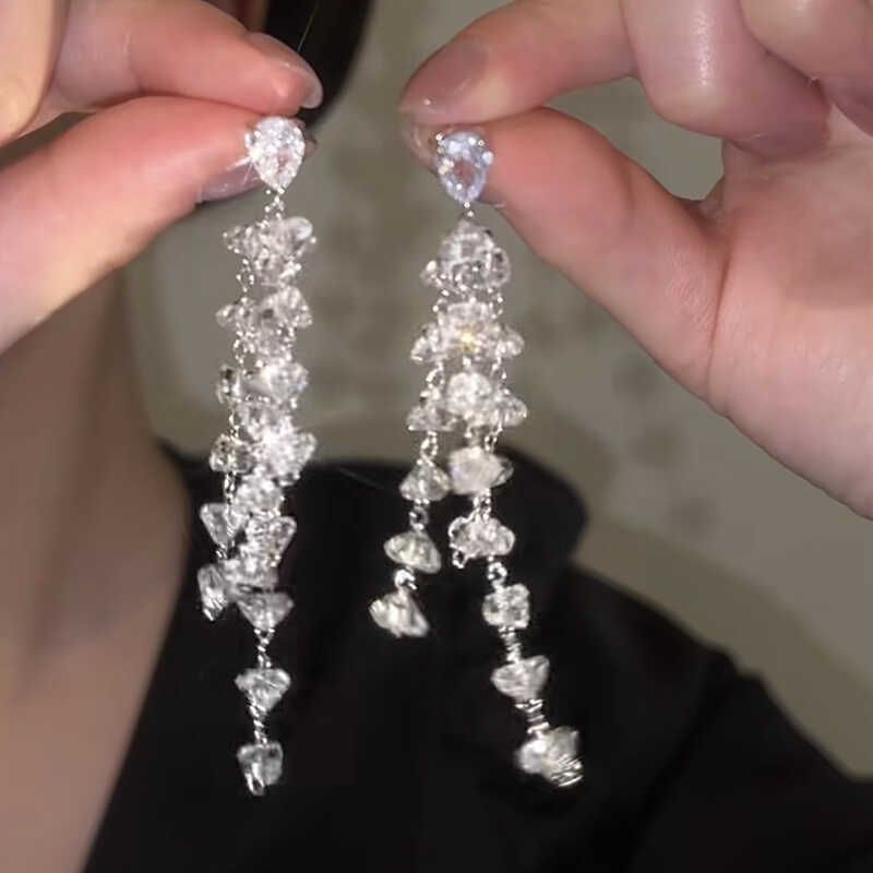 

Accessible Luxury Diamond-Embedded Crystal Tassel Earrings Women s 925 Silver Needle Exquisite zircon tassel