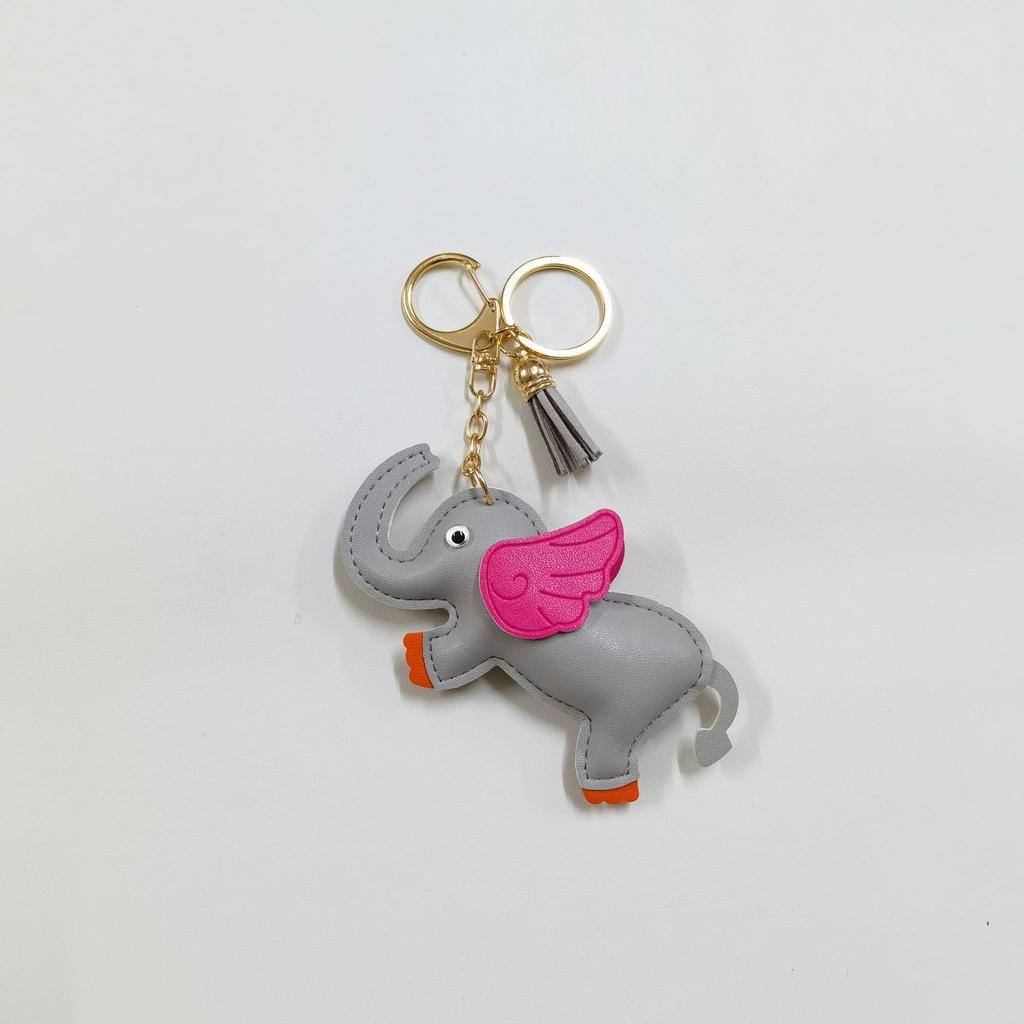 Creative flying elephant car keychain pendant leather bag pendant cute personalized car rearview mirror schoolbag pendant