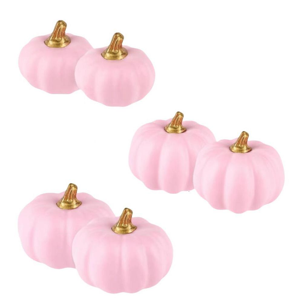 

Decorative foam pumpkins with detailed grooves and stems suitable for use as photo props or centerpieces at autumn events