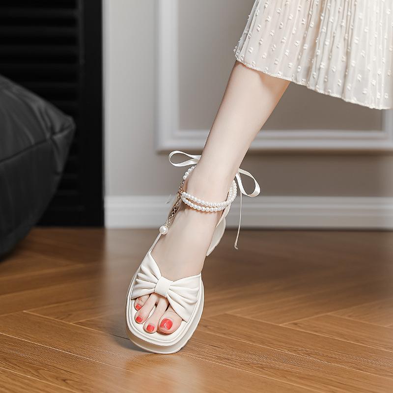 Platform sandals women's 2025 new summer not tired feet daughter gold wind pearl bow high heel soft sole Roman shoes
