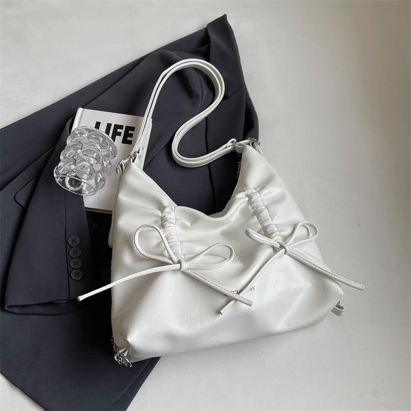 

Стильная простая сумка большой вместимости женская 2025 лето новая сумка подмышку с бантом премиальный рюкзак 31*10*23