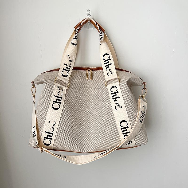 

Spring new largecapacity women s bags, commuting versatile tote bags, highend messenger niche design shoulder bags 44*33*18 білий