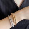 Luxuriöses 18 Karat Roségold-plattiertes Schlangenknochen-Armreif mit Diamanten für Damen