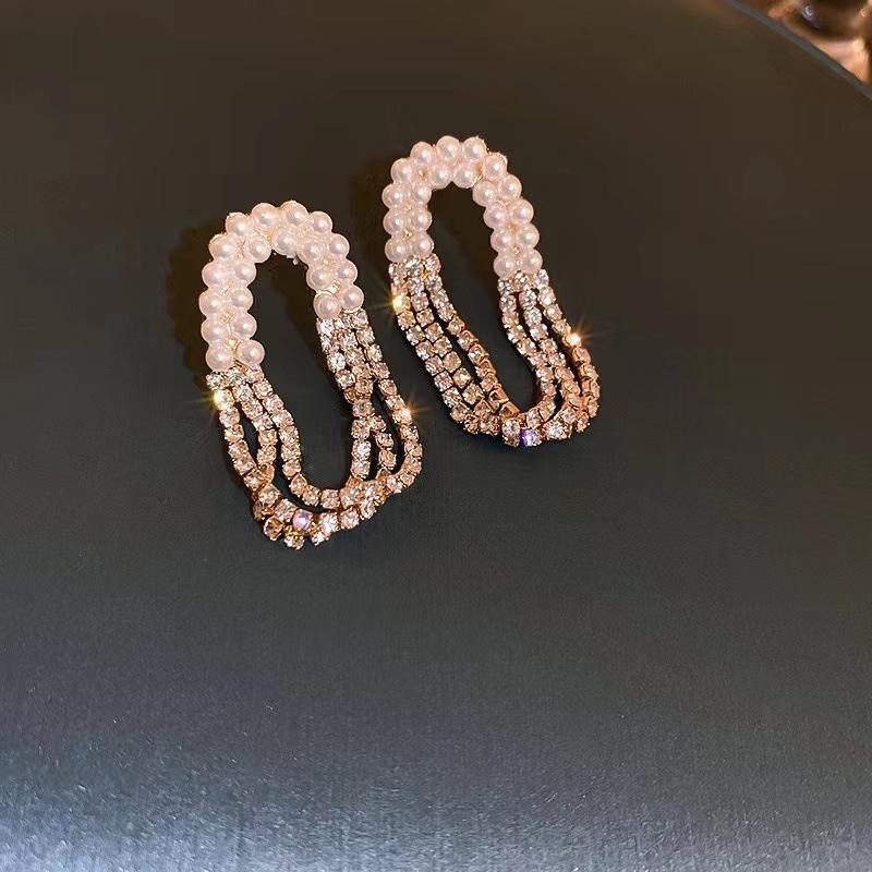 

Diamond-set pearl oval fringed earrings niche light luxury temperament versatile design stud earrings ear jewelry золотой