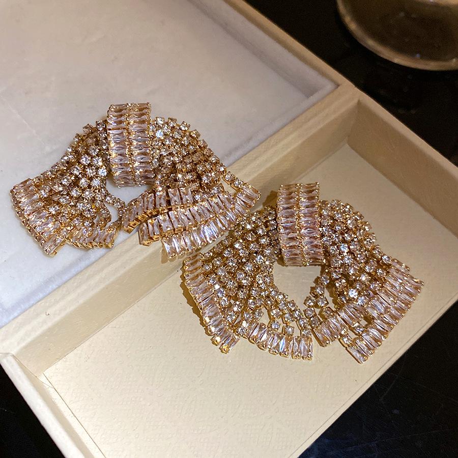 

European and American exaggerated silver needle diamond zircon bow stud earrings fashionable exquisite earrings light luxury high-end earrings