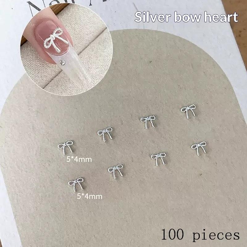 

100Pcs 3D Silver Small Bowkont Heart-Shaped Ornaments Nail Art Decorations Supplies Diy Alloy Bow Heart Nail Charms Accessories A2