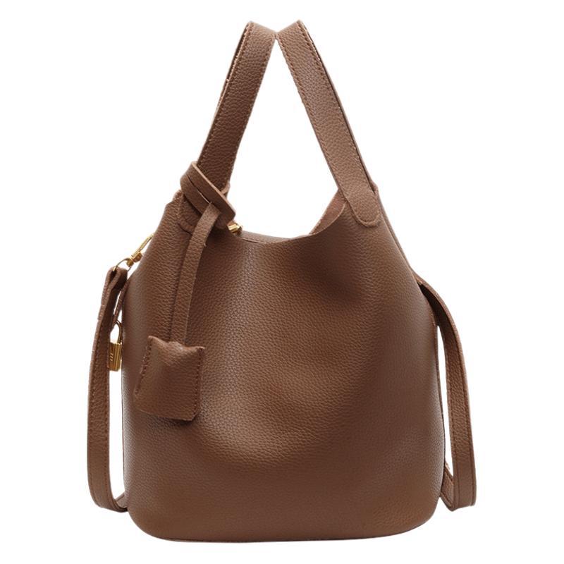 Texturovaná měkká kůže přenosná malá taška dámská 2025 nová móda ruční kbelíková taška podzim a zima všestranná retro crossbody taška