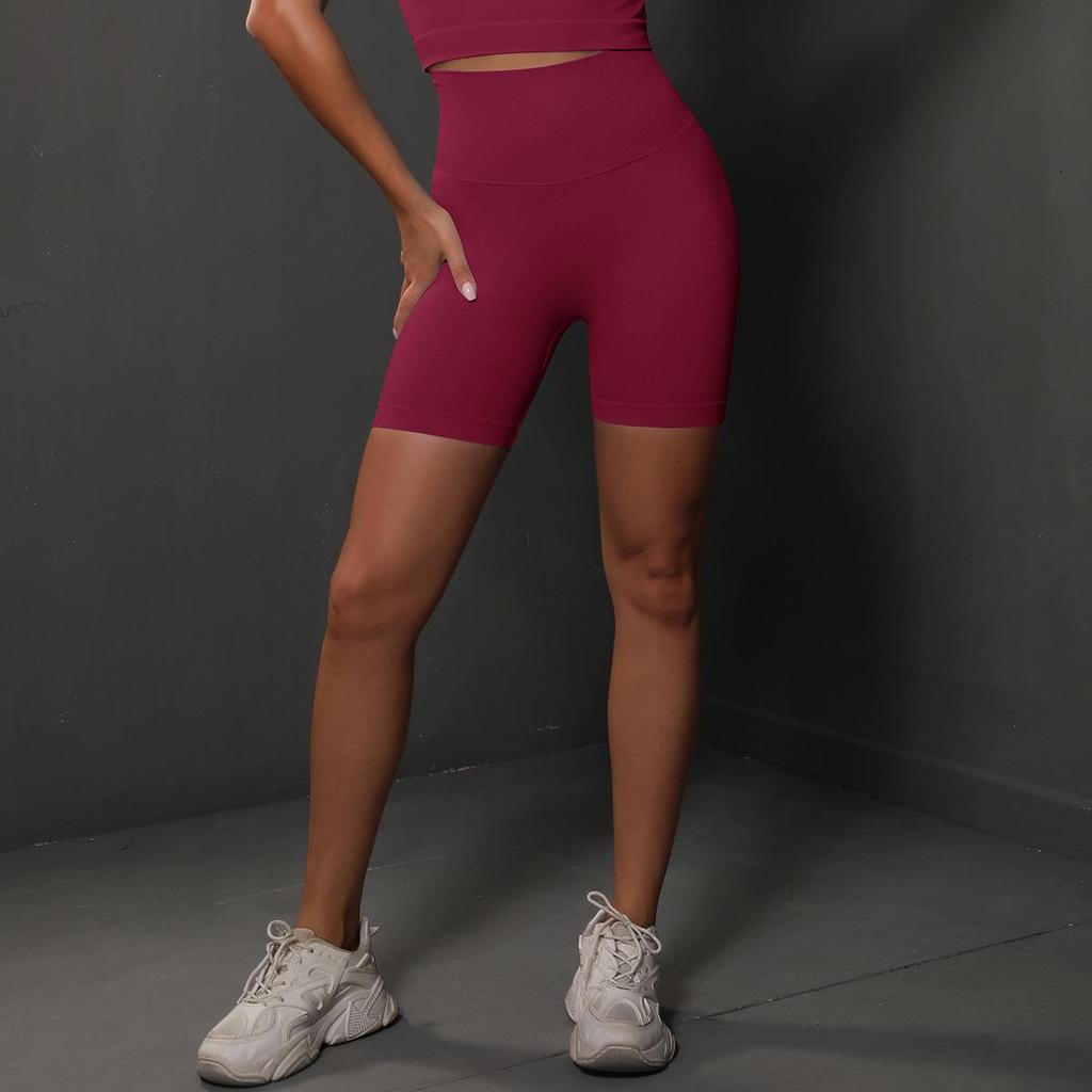 Women's Seamless Peach Smiley Yoga and Running Shorts - Breathable, Solid Color