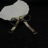 Vintage Copper-Plated Gold Tassel Bow Brooch - Versatile Sweater Corsage Accessory